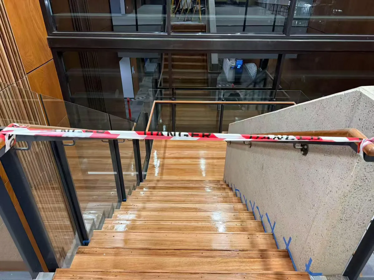 Refreshed timber staircase viewed alongside the station escalator at Tallawong Metro